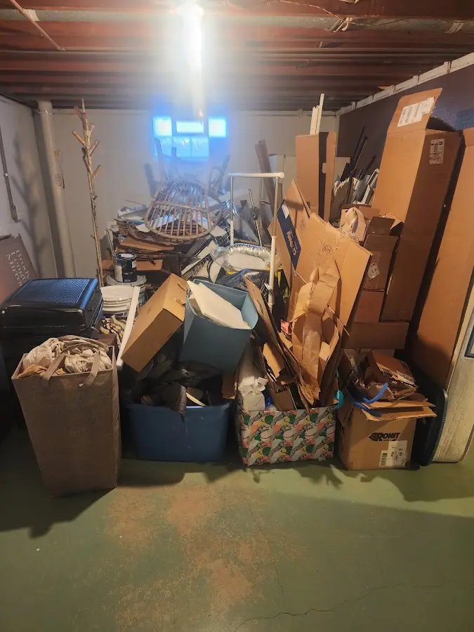 Roll-off dumpster container at job site for Construction Dumpster Rental in East Bethel